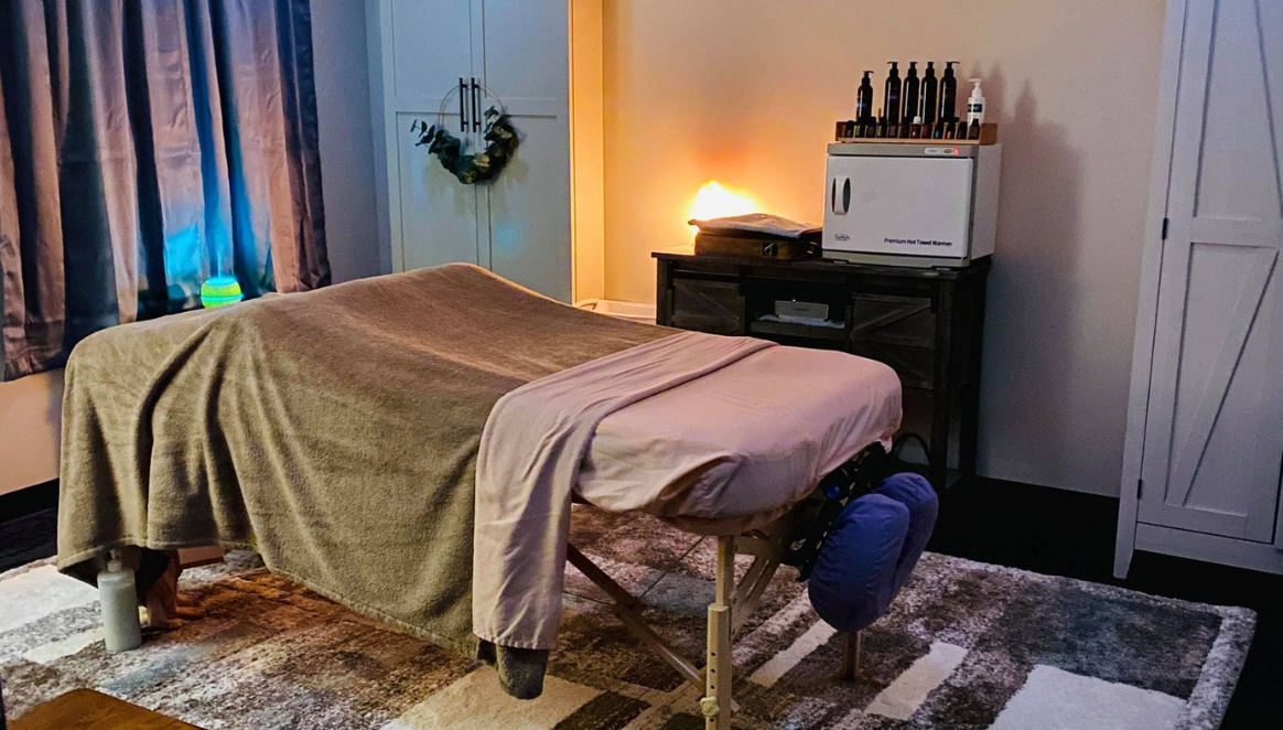 A massage table in a room.